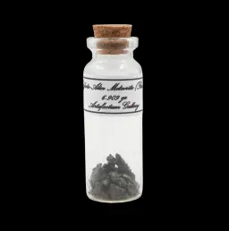 6.909 g Sikhote-Alin meteorite in sealed bottle, Russia
