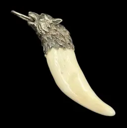 Guardian of the Wild: Wolf Tooth Pendant in Silver with Wolf Head Design