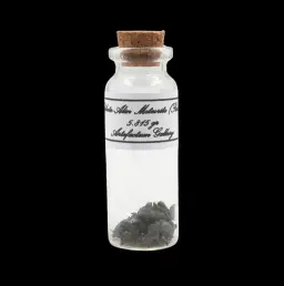 5.815 g Sikhote-Alin meteorite in sealed bottle, Russia