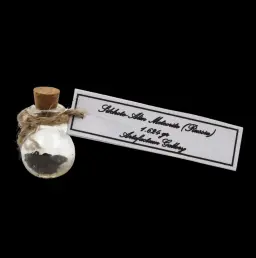 1.624 g Sikhote-Alin meteorite in sealed round bottle, Russia