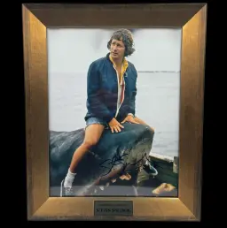 Authentic signature of Steven Spielberg on the photo from the production of the film "Jaws"