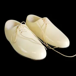 Pair of Decorative Shoes Carved from Fossil Mammoth Ivory