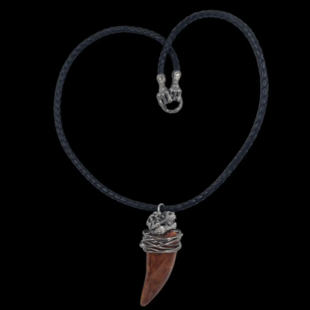 Silver pendant with Carcharodontosaurus tooth, 7.2 cm