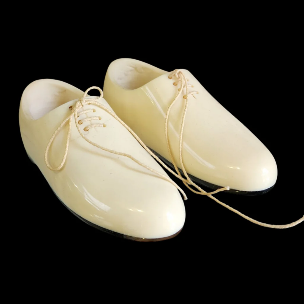 Pair of Decorative Shoes Carved from Fossil Mammoth Ivory