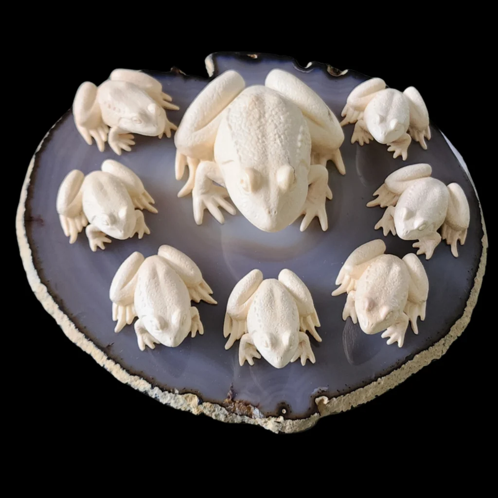 Circle of Prosperity: Mammoth Ivory Frogs on Agate