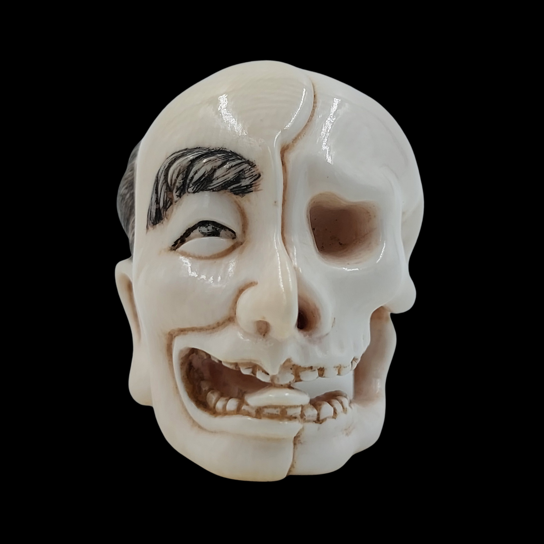 Japanese Half-Skull Half-Human Netsuke Carved from Mammoth Ivory Japanese Half-Skull Half-Human Netsuke Carved from Mammoth Ivory123