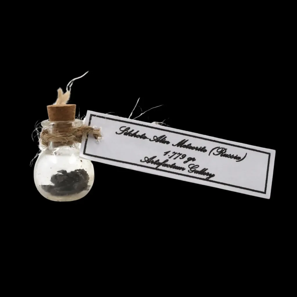 1.779 g Sikhote-Alin meteorite in sealed round bottle