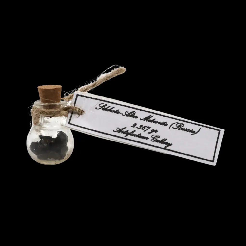 2.367 g Sikhote-Alin meteorite in sealed round bottle