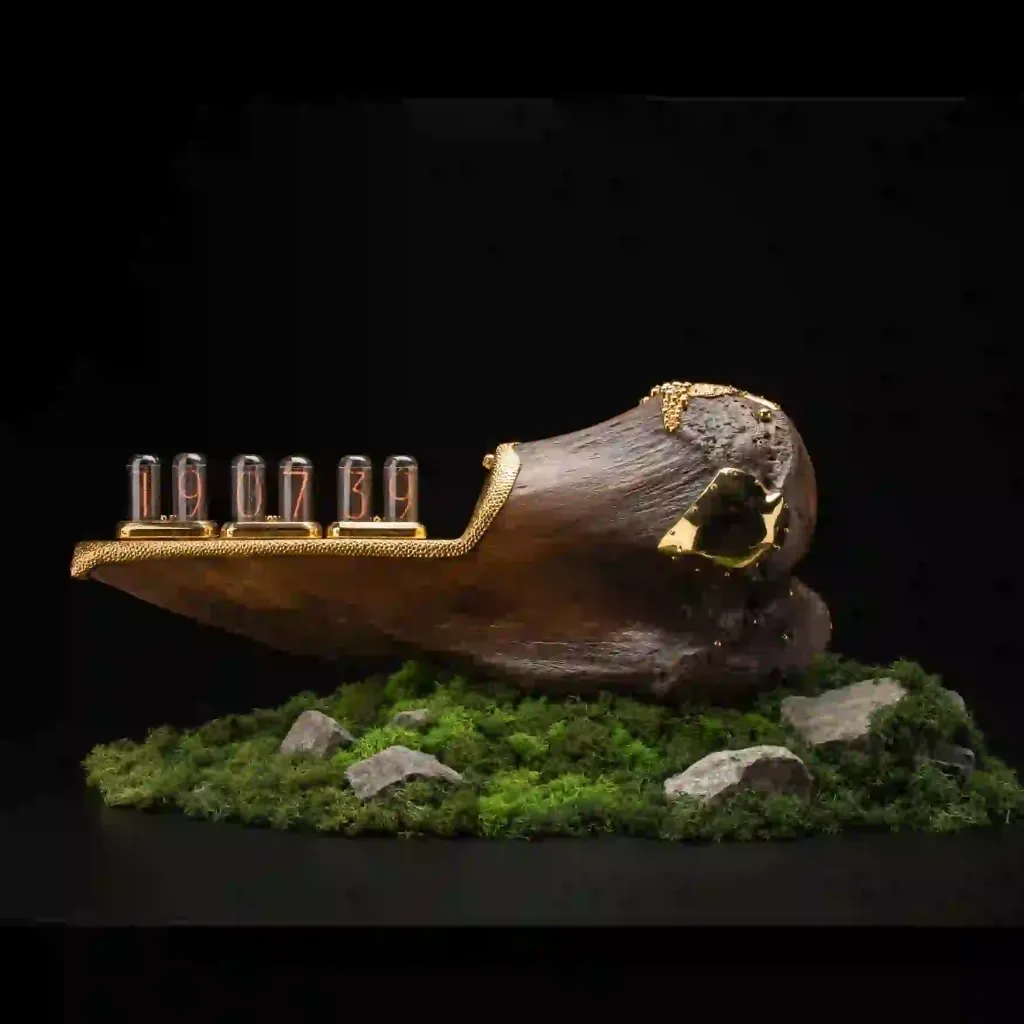 Mammoth thigh bone clock, 24k gold, circa 40 000 years old, 2023